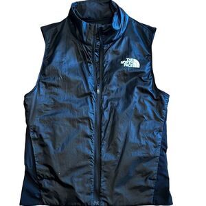 The north faced women’s running vest, reflective back size small